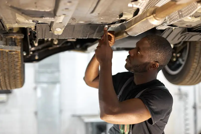 Autotecg apprentice under vehicle